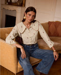 Blusa de cuello bobo con bordados | Roseline